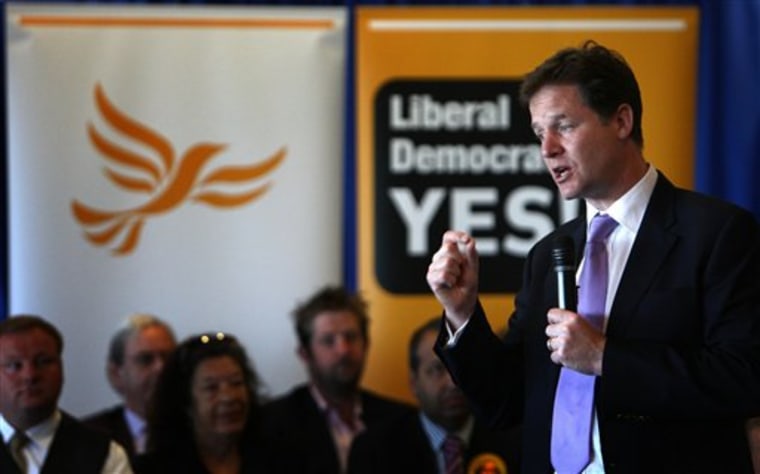 Britain's Deputy Prime Minister Nick Clegg answers questions about the proposed new voting system at the Walker's Stadium, Leicester, Wednesday.